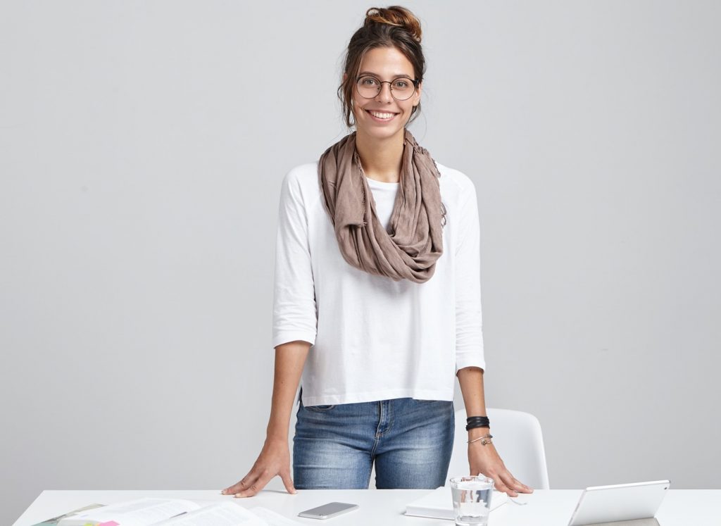 A female home builder working on designs