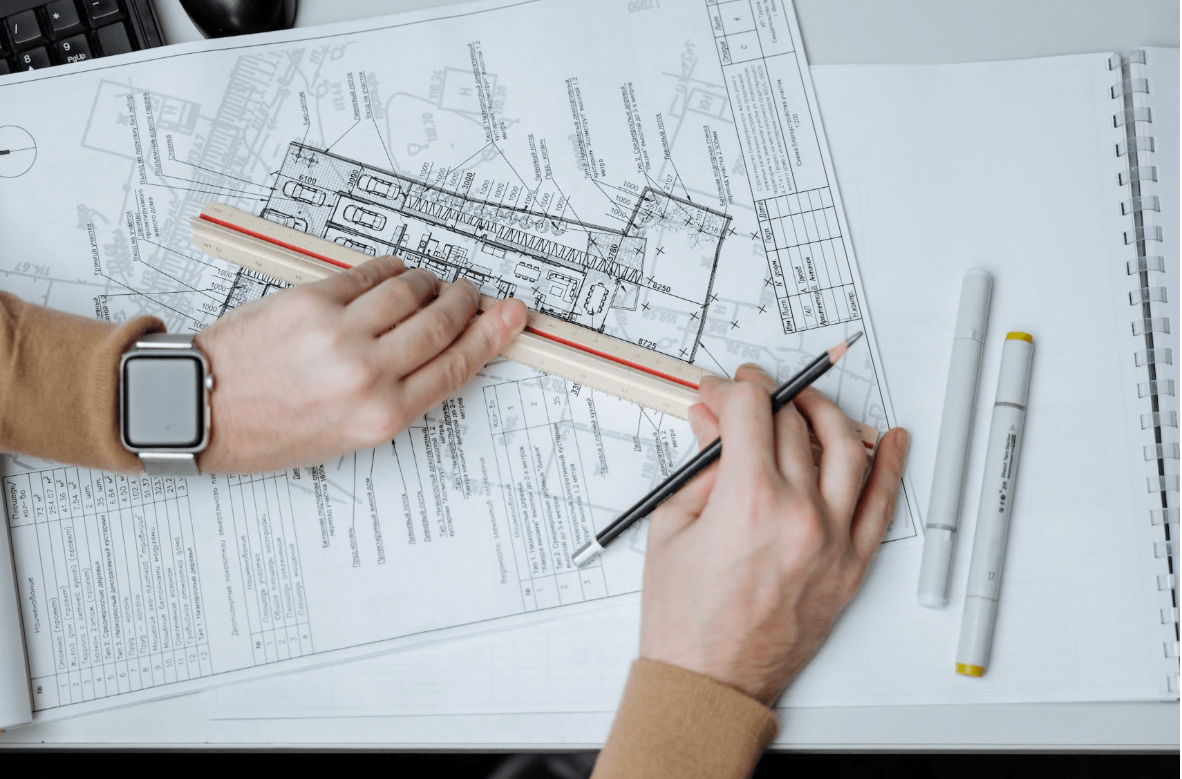 architect drawing house plans